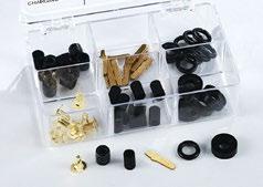 assortment of replacement gaskets, o-rings and depressors for charging hoses and adapters.