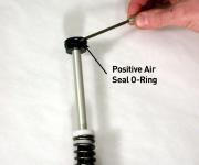 VERY IMPORTANT! After the air seal o-ring has been replaced, apply a light coating of RockShox 15 wt. oil or RedRum to the o-ring air seal (aids installation).