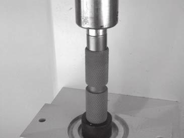 Install bearing insertion tool (Figure 63, item CC)(25-10, part of tool kit 4500) into arbor press