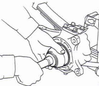 Remove the driveshaft thrust washer and then remove the driveshaft from the axle housing. Fig 7 8.