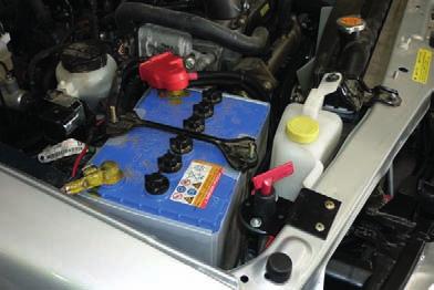 13. Connect the thin black earth wire and negative battery cable to the earth connection on the opposite side of winch motor. 14.