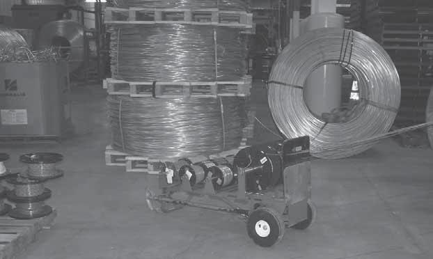 rack on its side, removing hitch pin and shaft, roll-out and roll-in desired new spool Motionless vise attached to the back of the carts for cutting 1/2, 3/4 and 1 conduit Rated for 600 lb.