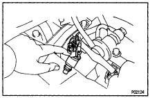 (b) If you have no sound scope, you can check the injector transmission operation with your finger.