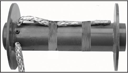 REPLACE THE ROPE 1. Engage the clutch by turning the cultch knob to the in position. 2. When inserting the wire rope into the drum, insert it into the correct end of the hole provided. (See Fig.