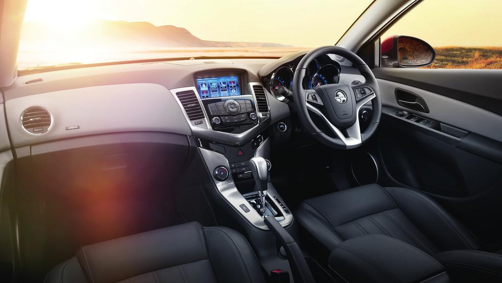 Cruze CDX Interior CONNECTED IN EVERY SENSE The sophisticated interior is designed to make your life as uncomplicated as possible. The MyLink Infotainment System seamlessly links you with your world.