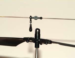 Installing the Stabalizing Flybar Connect the weighted fly bar by gently, but firmly, rolling and
