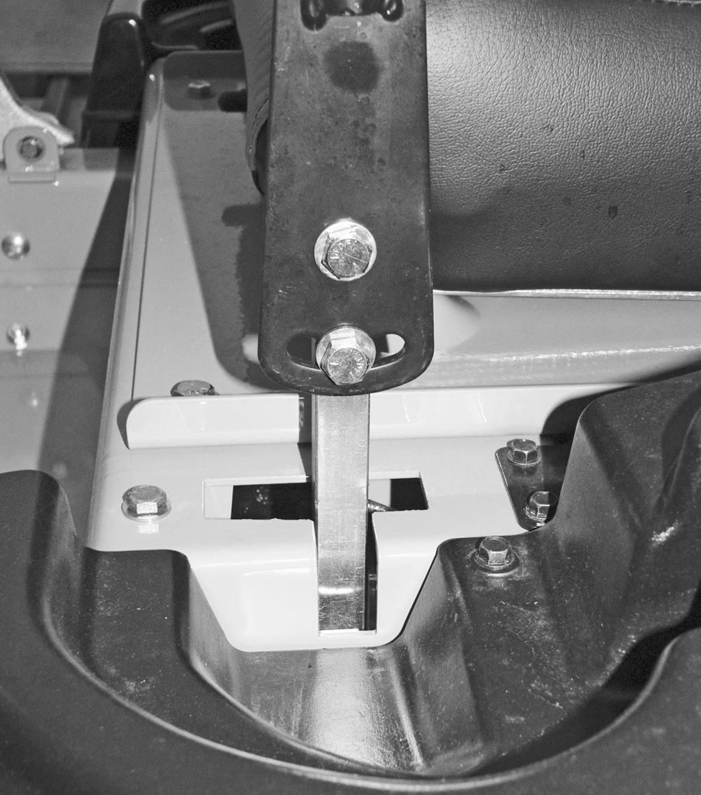 align the holes in it with the holes in the lower lever. Re-install the cap screws and tighten.