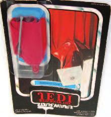 1920 s comprising tinprinted garage with cream walls and grey roof, and black detailing, missing door latch 40-60 Lot 3275 3275 Kenner Star Wars Return of the Jedi Darth Vader 3 3/4 figure on 77