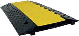 Rubber Cable Ramp These heavy duty cable bridges protect valuable cables and cords from heavy traffic. They are constructed of high-density rubber with a diamond tread surface for sure traction.