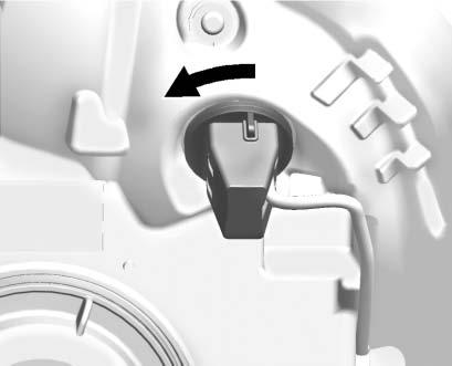 Install the new bulb in the headlamp assembly by turning clockwise. 6.