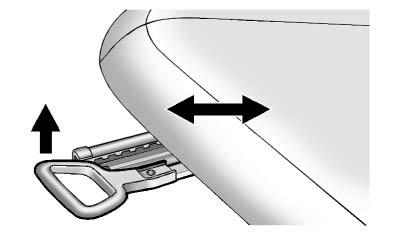 To lower the head restraint, press the button on the top of the seatback, and push the head restraint down.
