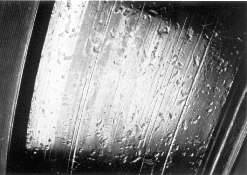 Figure 17 shows damage to an outer race from a bearing subjected to vibration while the unit is not rotating. Notice the even spacing of the marks, which correspond to the roller spacing.