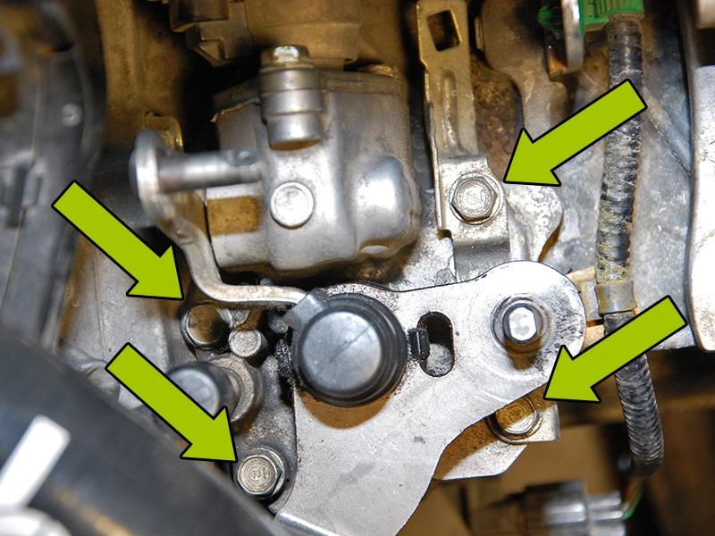 Once you are completely sure the car is in neutral, we will remove the shifter arm assembly from the transmission.