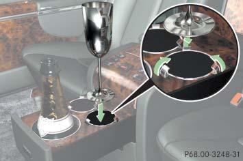 Controls in detail Useful features Inserting champagne flutes i Use the champagne flutes from the Maybach Accessory range. Only those flutes are designed for use with the holder.