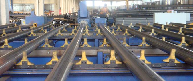End Facing EF8 The machine is composed by: Transfer system between the different stations Two end facing and chamfering heads Tube aligning system Hydraulic equipment Electrical equipment The plant