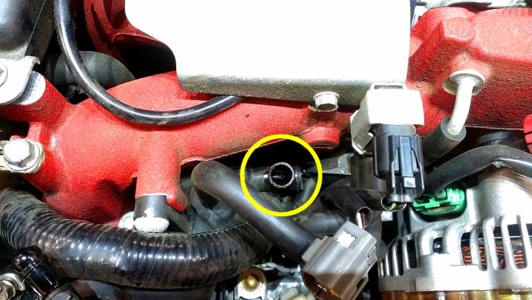 Be careful not to break the plastic elbow that sticks out of the turbo inlet. Take the 5 / 8 rubber cap and place it over the elbow.