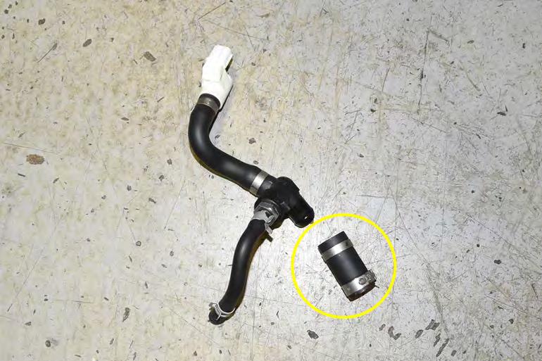 18. Locate the ¾ OEM drain hose that the PCV assembly was connected to.