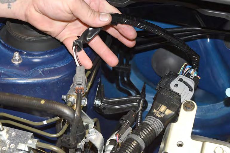 27. Remove main wiring harness bracket