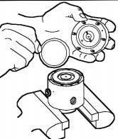 Remove the lower seat, gasket, pilot plug and lower spring. (Fig. 13 & 14) Figure 13 Figure 8 To reassemble the controller, reverse the above procedure.