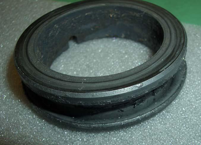 An example of a mechanical seal where the seal faces have been allowed to run dry The sealing surface is scored Burnt debris found on the inner diamete O ring is deformed (being axially moved from