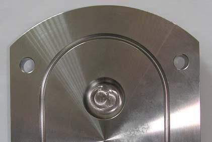 Typical cavitation effect on pump rotorcase cover.