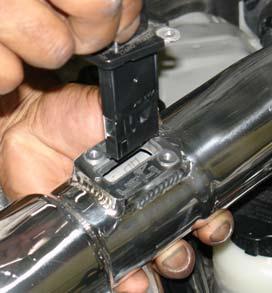 end, adjust and tighten the clamp on the silicone hose Page 5 of