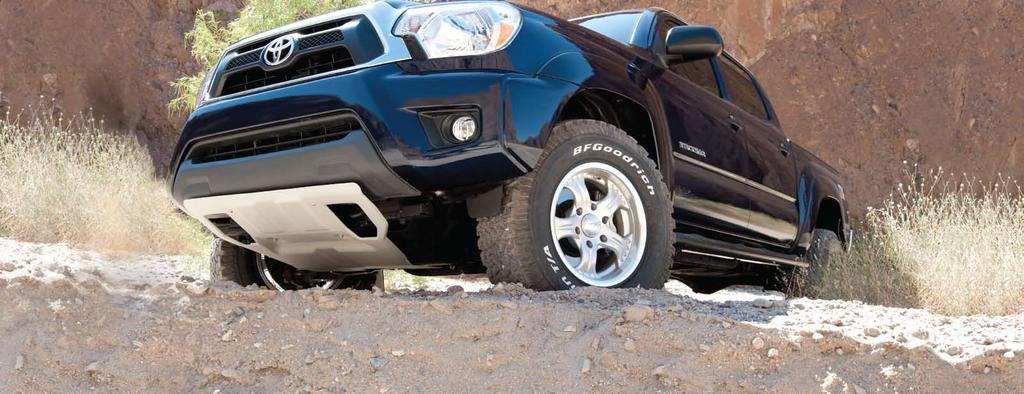 < FRONT SKID PLATE The front skid plate is made from 1/8 stamped and formed, silver powder coated aluminum and features a vehicle-specific design that helps to protect your Tacoma