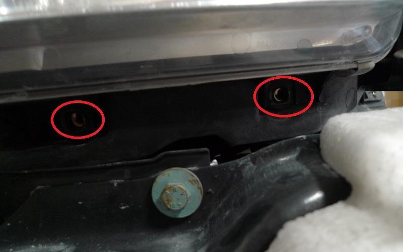 After the front grille area & the bottom screws from under front bumper is loosen, there will be 2 screws under the