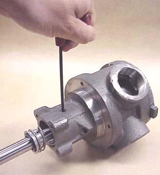 Tap the shaft forward and remove the rotor and shaft assembly from the casing and bushing assembly. Figure 11, Installing the Seal 5.
