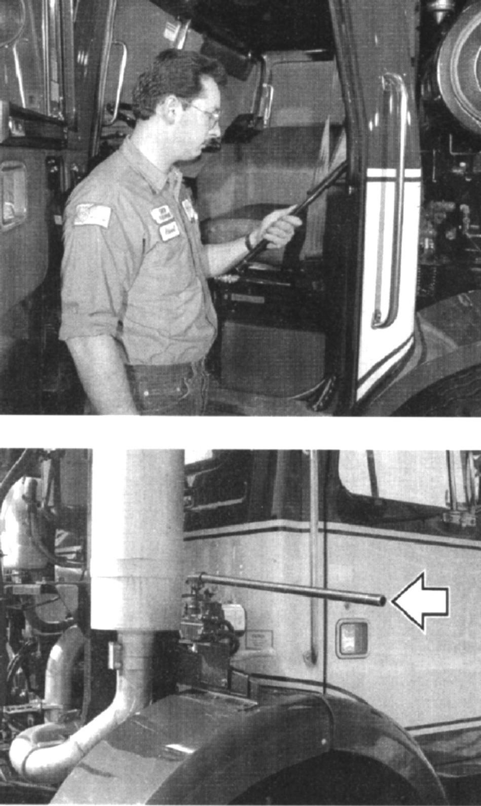 SERVICE PROGRAM Remove the pump handle from its storage location on either the driver or passenger side rear cab corner. It is held in place with two clips to the cab wall.