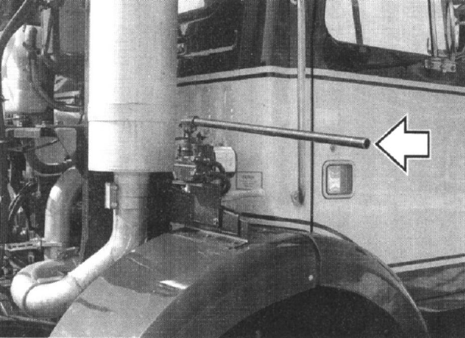 Lowering the Cab Place the flow valve selector on the cab tilt pump pointing forward. The text on the selector handle that reads LOWER is now facing out.