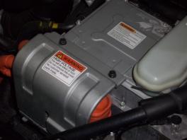 During deceleration or braking, it acts as an alternator and charges the HV battery by converting the vehicle