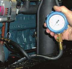 Checking Engine Oil Pressure 1 Remove the oil switch and set a pressure tester (Code No. 07916-32031). 2 Start the engine. After warming up, measure the oil pressure of both idling and rated speeds.