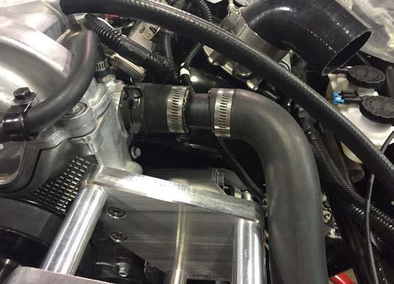 12 Trim the factory upper radiator hose as shown to the right.