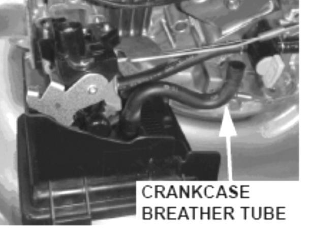 Install a temperature regulator bracket on the cylinder barrel to help the thermo-wax heat up faster. Important: Allow the engine to cool for at least an hour before beginning the repair.