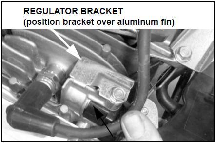 Install a temperature regulator bracket 1. Remove the three 6 mm flange nuts and the recoil starter. 2. If there is gasoline in the fuel tank, drain into an approved container.