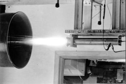 Figure 6. A typical HTPB firing of the UALR thruster. testbed for all types of rocket motor studies, such as fuel composition, combustion stability, and base heating effects.