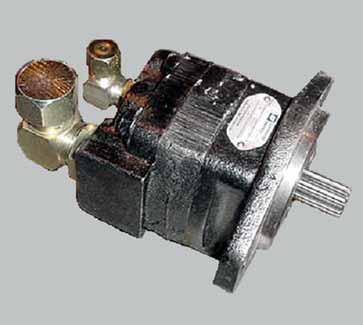 GENERAL 2-2.1a Hydraulic Gear Pump Figure 2-1: Hydraulic Gear Pump The larger line is inlet from hydraulic tank; the smaller line is pressure line that drives the foam pump.