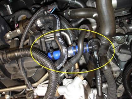 You may choose to save this length of OEM hose for possibly returning the car to stock later. This location is also the standard location for most boost gauge reference installations.