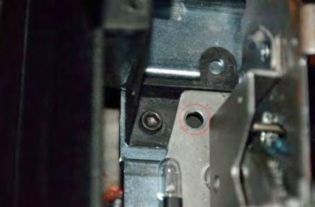 23. You will notice that when attempting to install the shifter that the consoles plastic bracket is covering up a mounting point for the shifter.