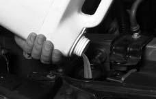 6. Rinse or wipe any spilled coolant from the engine and the compartment. 7. Replace the 3800 Series II V6 engine cover shield. 7.1. Remove the oil fill tube, with cap attached, from the valve cover.