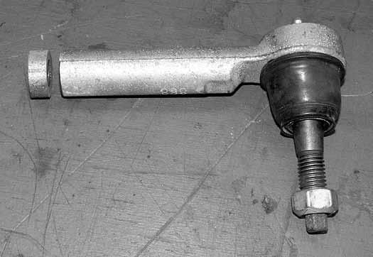 Trim 3/8 off of both the tie rod end and the steering link Figure 13B,C.