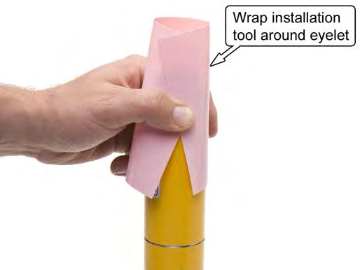 Wrap the installation tool around the shock body with half of the
