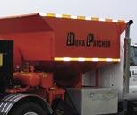 Seven cubic yard hopper provides extended patching without reloading.