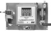 System Controls Model 85530 Lubrication System Controller Controls lubrication frequency and monitors supply line pressure. The LCD displays operating status.