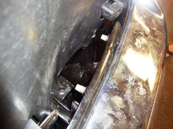 harness on the driver side of the factory bumper, (Photo 4).