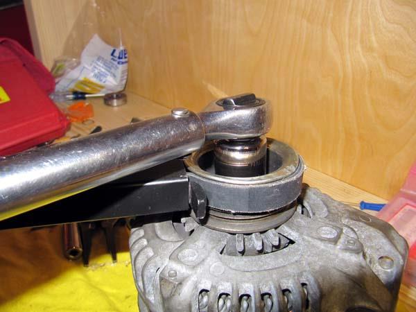 #38 Install the pulley and tighten down the pulley locknut to 81 ft-lb.
