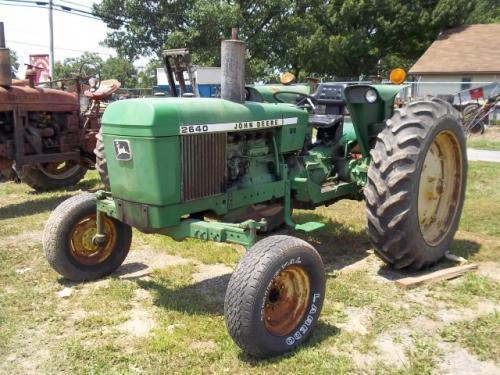 Auctions include farm equipment, hay, lumber, and