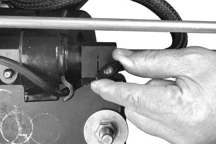 Tighten the knob to reduce the effort required to hold a throttle setting.. Steering friction knob 0068.
