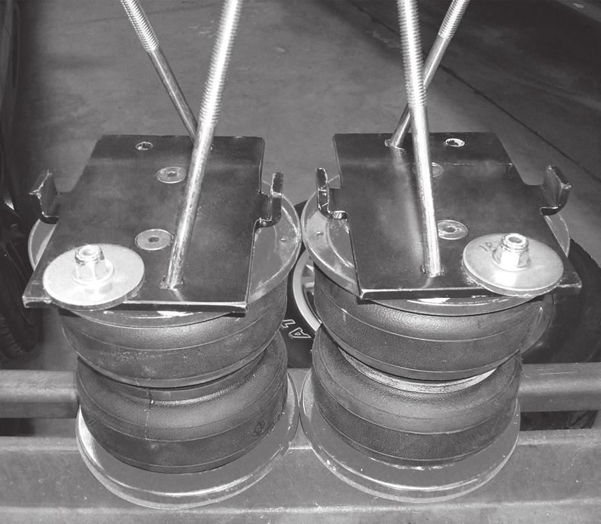 Insert the long 3/8 carriage bolts (F) into the square holes in the lower bracket opposite side of the flanges (Figs. 1 & 11). (F) (C) (H) (U) fig. 11 8.